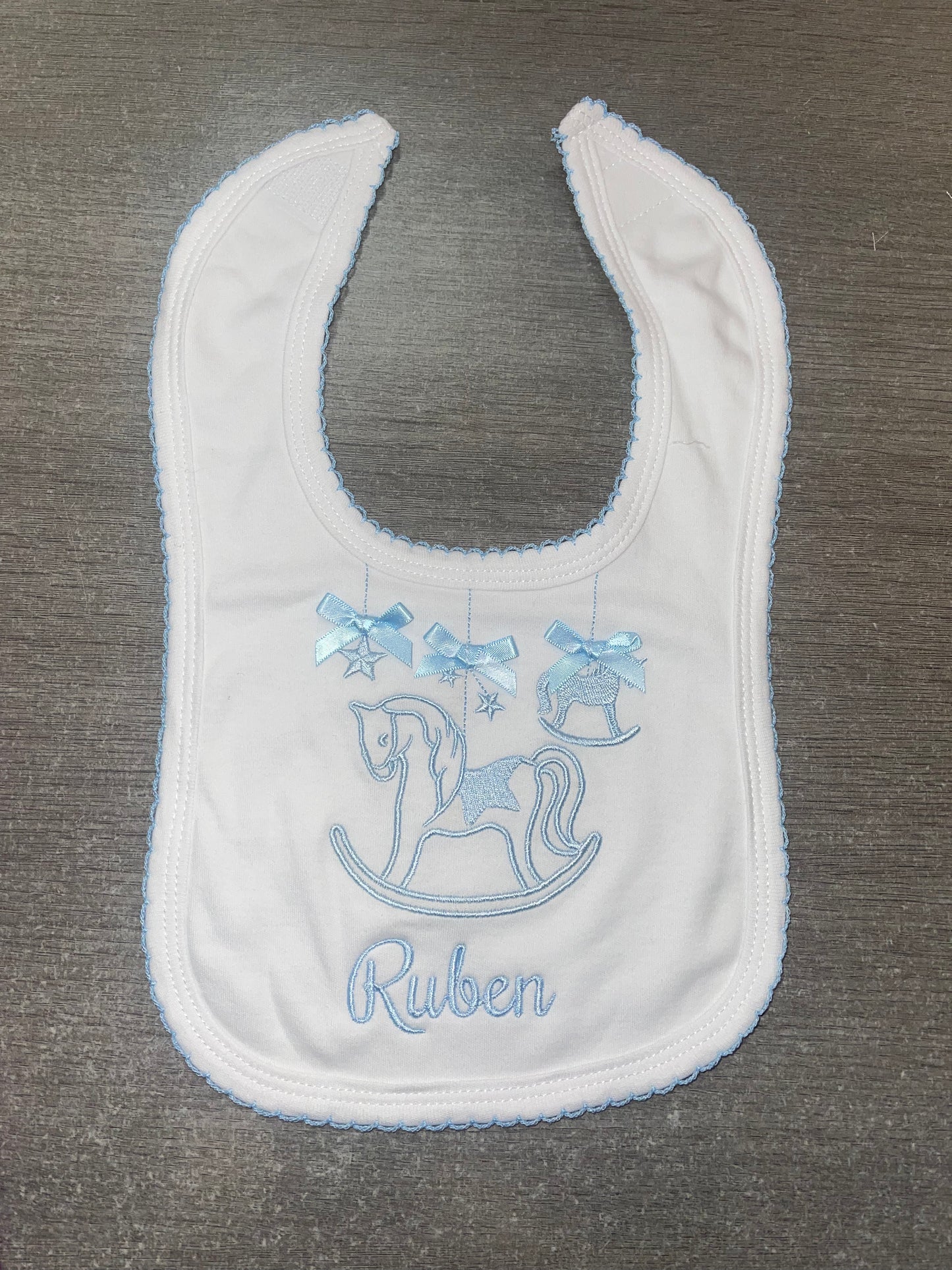 Personalised white & blue rocking horse bib