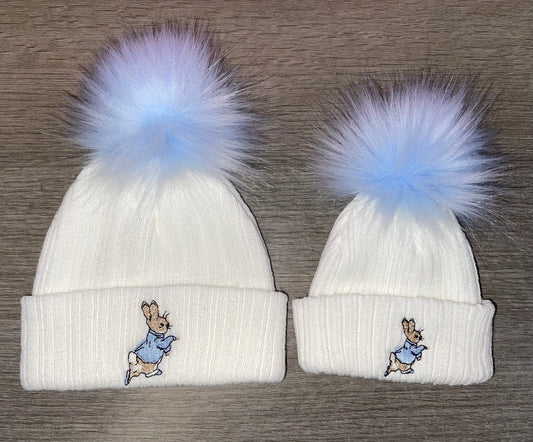 Babies knitted white & blue peter Rabbit pom pom hats