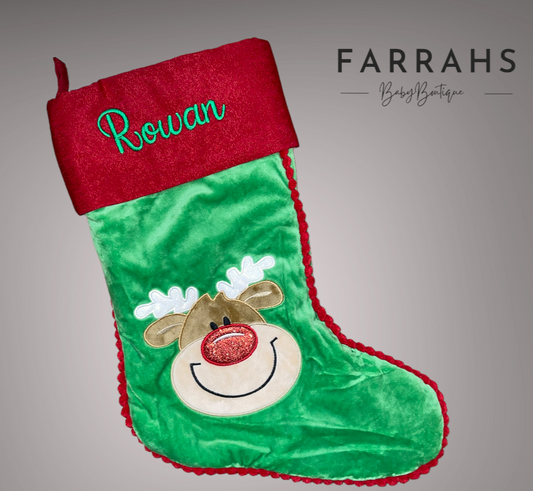 Green stocking with reindeer design