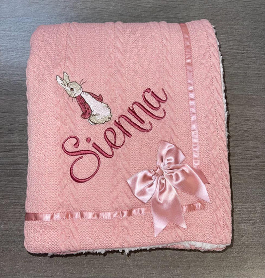 Beautiful personalised Rose gold cable knit bow blanket with Flopsy Rabbit