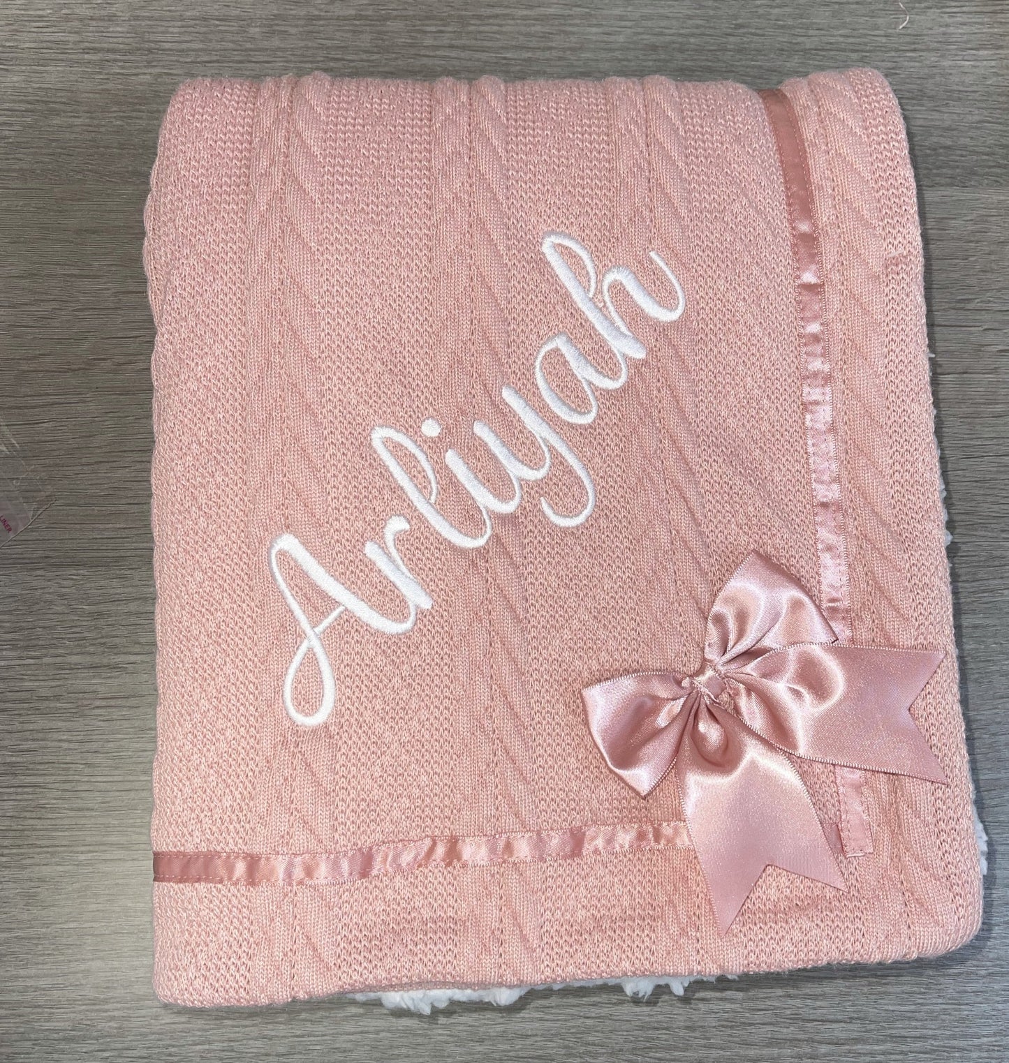 beautiful personalised Rose gold cable knit bow blanket